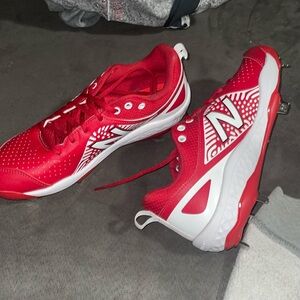New balance women’s metal softball cleats Brand new never worn
